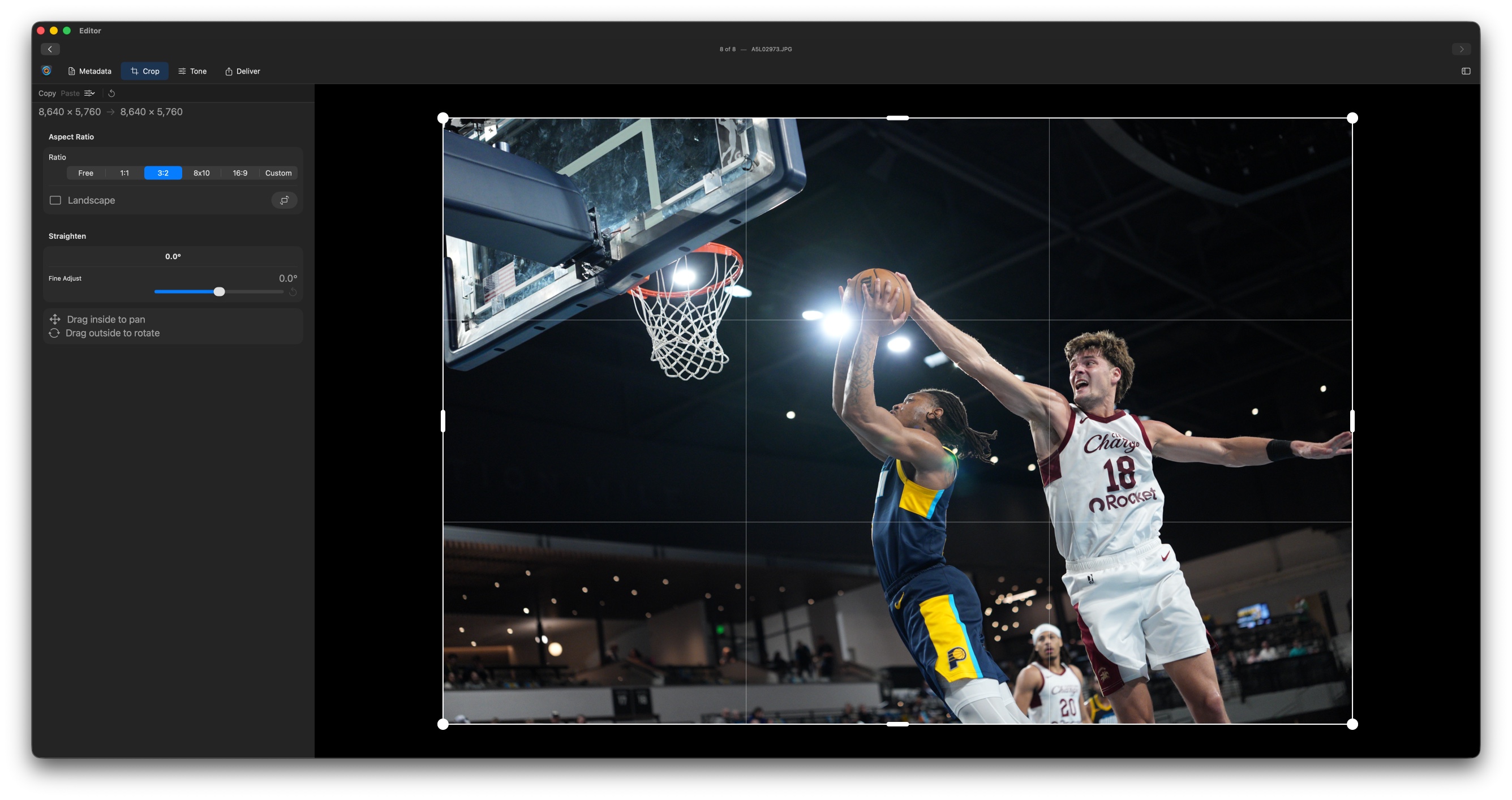 Crop tool active on an image with the rule-of-thirds overlay and aspect ratio controls visible.